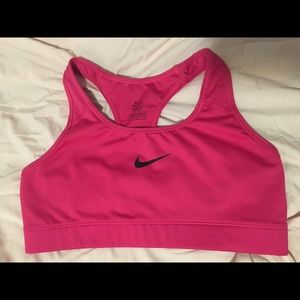 Hot pink Nike sports bra